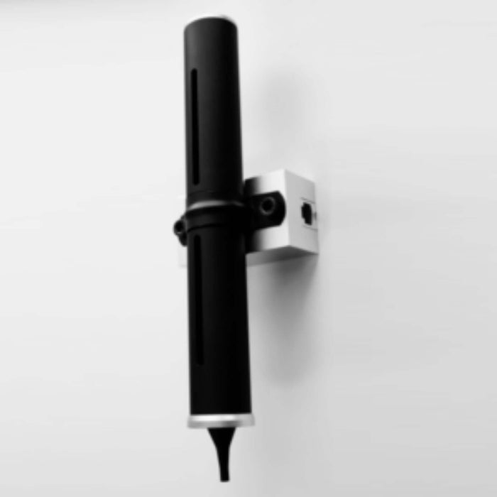 Firefly Specula Dispenser mounted on a wall for easy access in medical settings.